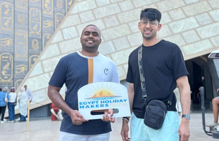 a wonderful shot of two of our visitors in front of the grand egyptian museum