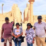 a wonderful shot of two friends and their wives from our visitors in front of luxor temple